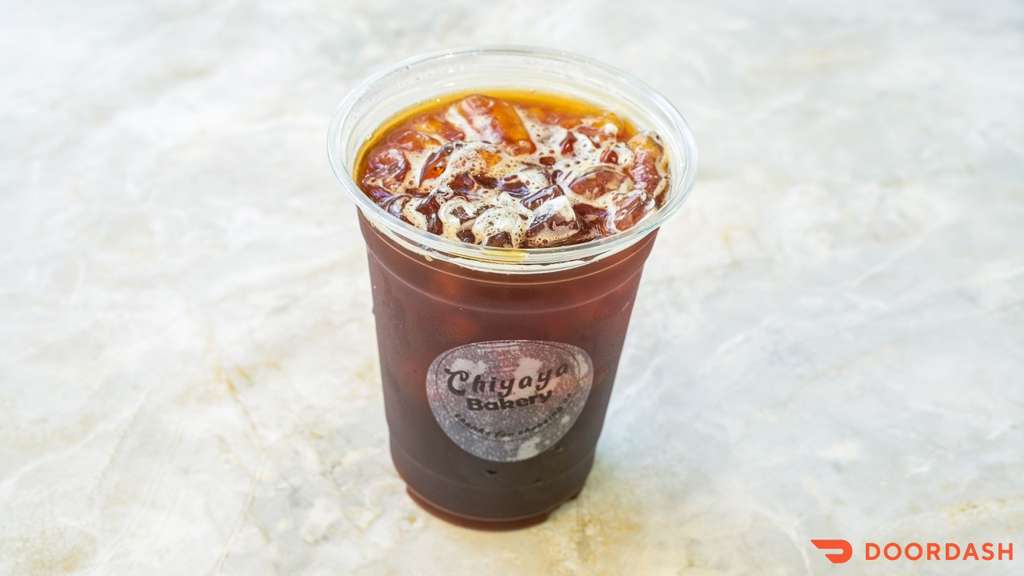 Iced Americano — Smooth espresso shots over ice with cold filtered water.
