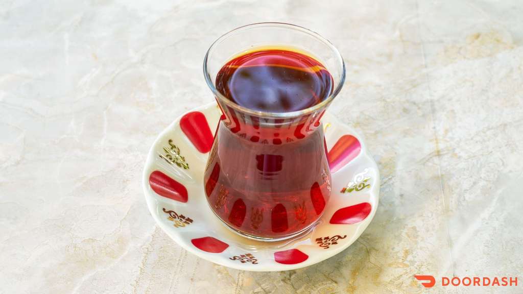 Turkish Tea — Authentic Turkish black tea brewed in a double teapot, served in tulip glass.